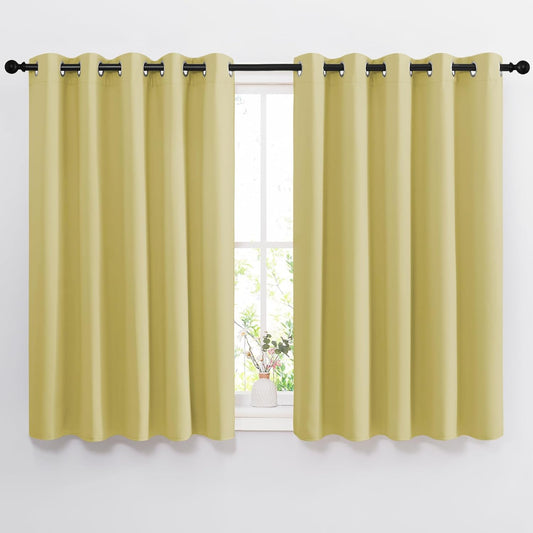 NICETOWN Room Darkening Curtains and Drapes for Kitchen - Thermal Insulated Solid Grommet Top Room Darkening Panels/Draperies for Kid's Room (Paler Yellow, 1 Pair, 66 x 54 Inch)