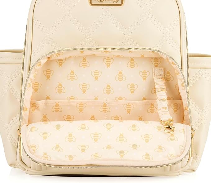 Itzy Ritzy Mini Diaper Bag Backpack – Chic, Compact Mini Plus Backpack with Changing Pad, 10 Pockets (6 Internal, 4 External), Grab-Top Handle & Rubber Feet (Milk & Honey) - Image 9