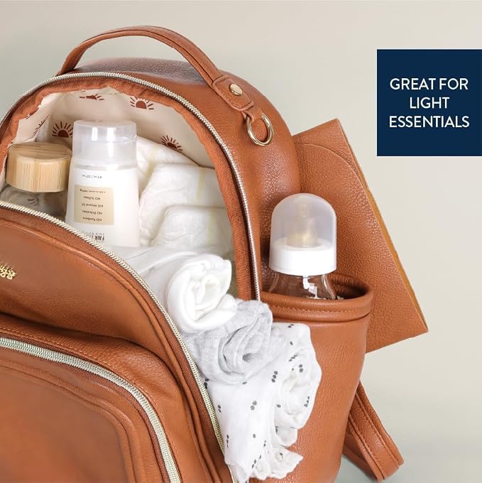 Itzy Ritzy Mini Diaper Bag Backpack - 10 Pockets w/Changing Pad (Cognac) | Chic Mini Plus Diaper Bag with 2 Insulated Bottle Pockets, Key Lanyard, Wipeable Changing Pad, Grab-Top Handle & Rubber Feet - Image 8