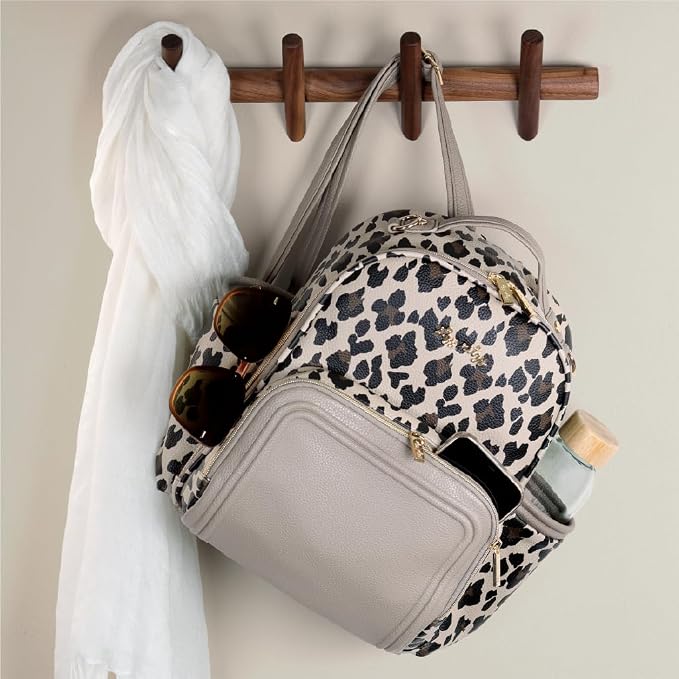 Itzy Ritzy Mini Diaper Bag Backpack - 10 Pockets w/Changing Pad (Leopard) | Chic Mini Plus Diaper Bag with 2 Insulated Bottle Pockets, Key Lanyard, Wipeable Changing Pad, Grab-Top Handle & Rubber Feet - Image 9
