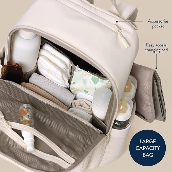 Itzy Ritzy Utility Diaper Bag Backpack, 17 Pockets w/Changing Pad (Cream) | Travel-Ready Diaper Backpack with 2 Insulated Bottle Holders, Laptop Compartment, Trolley Sleeve, Straps, and Changing Pad - Image 7